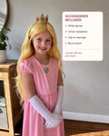 Child modeling the crown headband, white gloves, clip-on earrings, and blue brooch